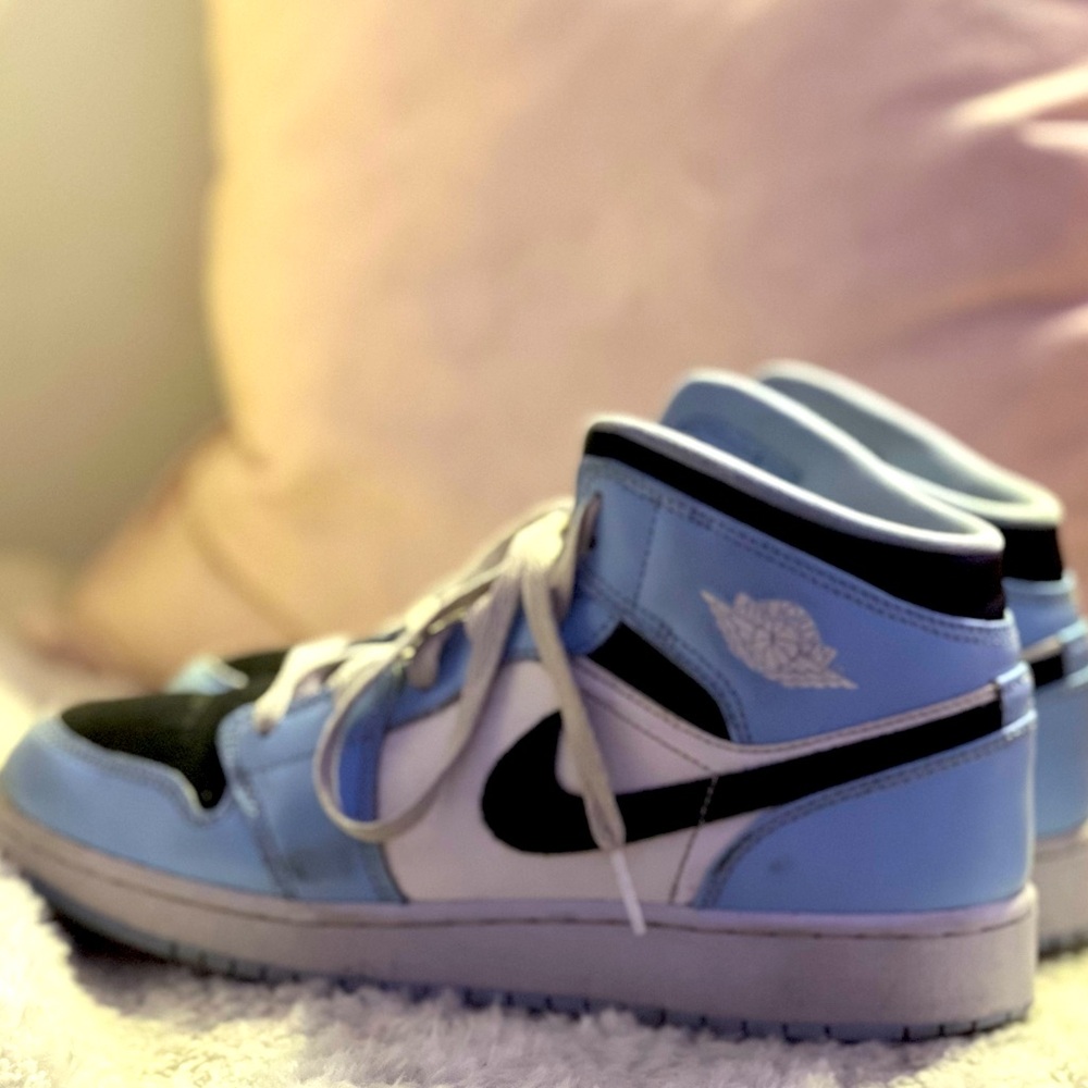 Air Jordan’s one high women’s blue and black Nike